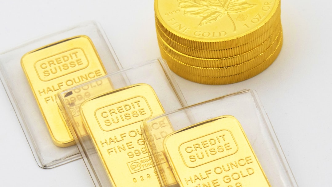 Gold bars and coins close-up